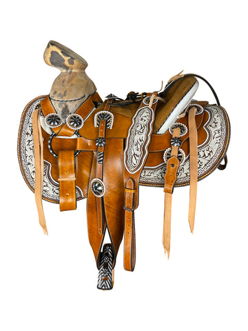 214 - Montura piteada con herraje en pavón negro